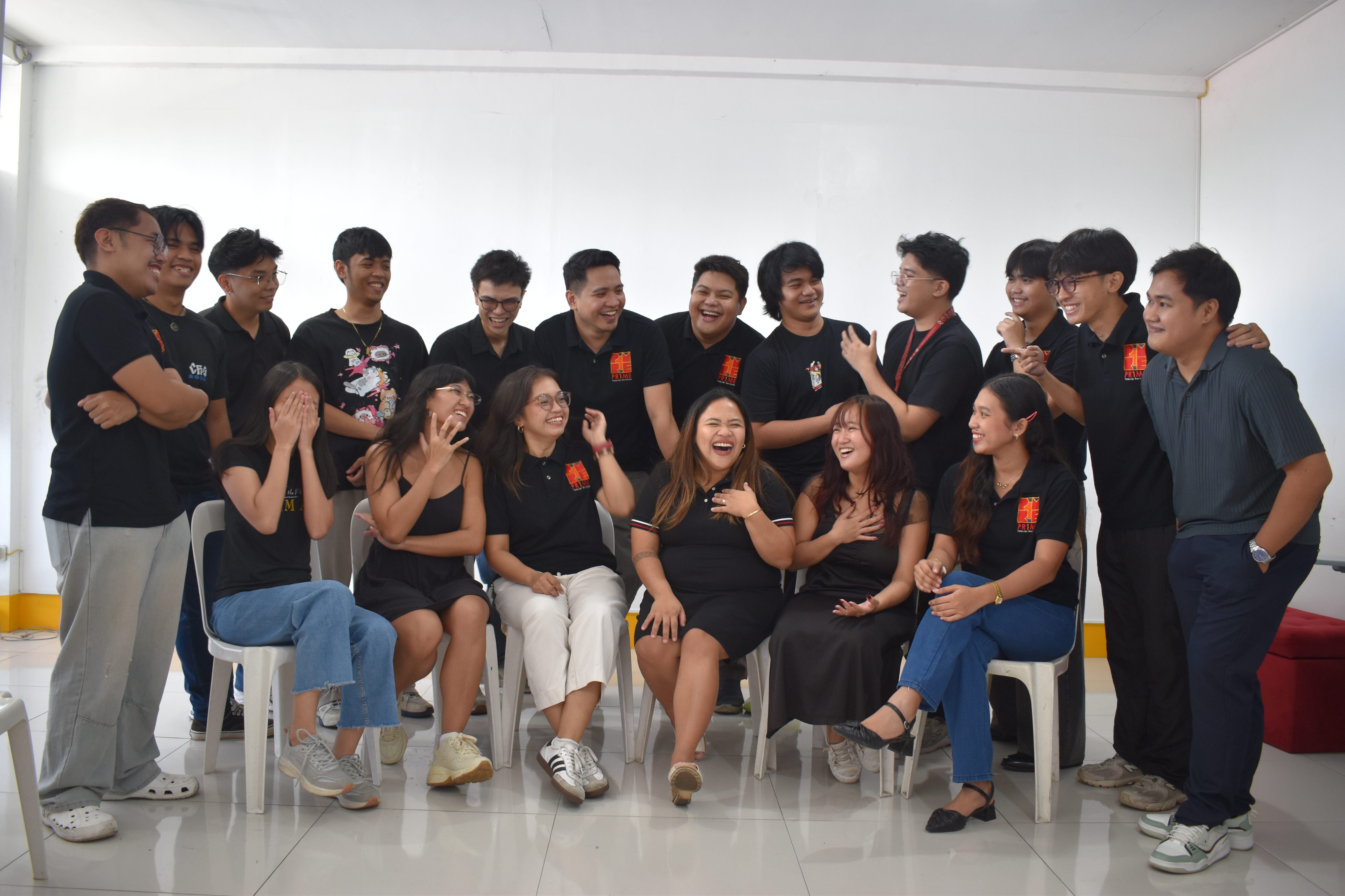 Pr1me tutor team laughing group photo